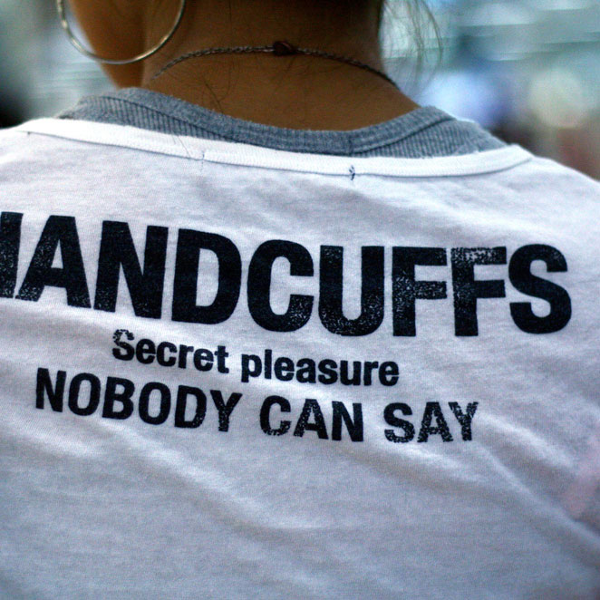 This girl's grey undershirt and white T-shirt both
have a knit binding at the neckline This girl's grey undershirt and white T-shirt both have a knit binding at the
neckline.